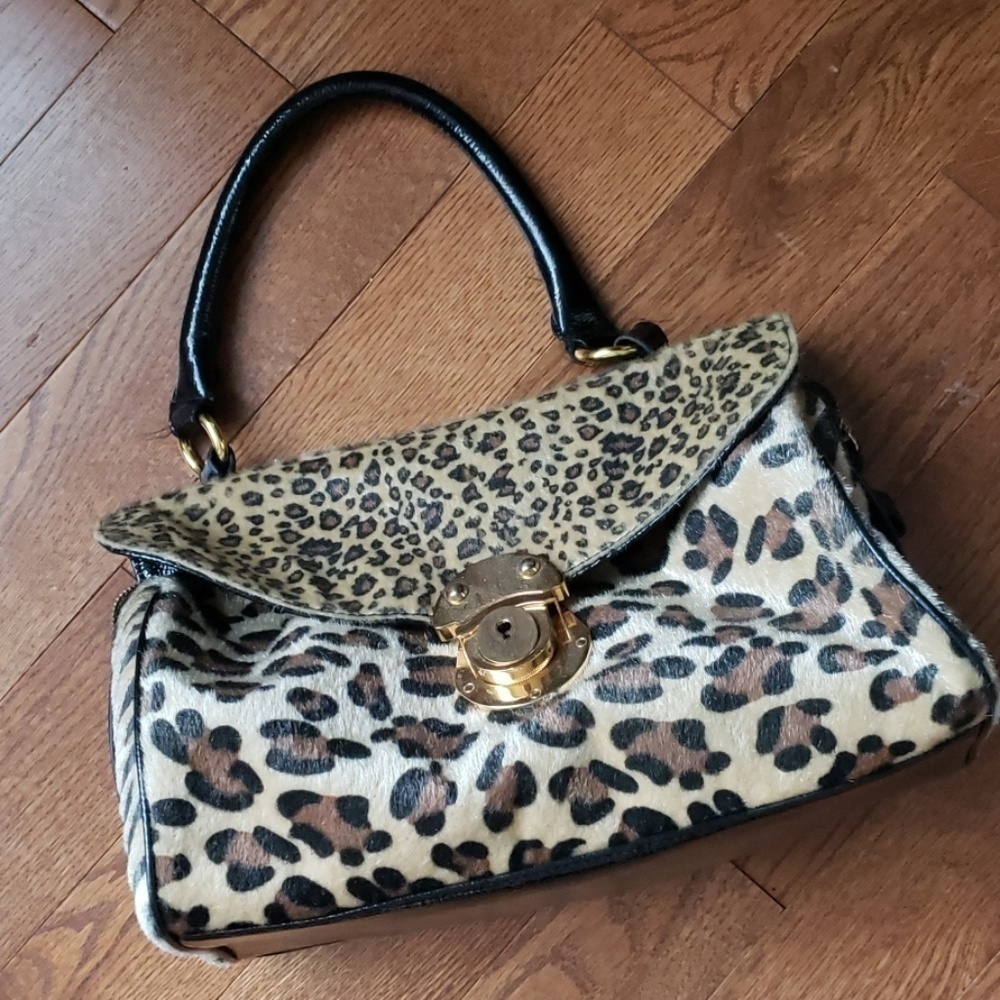 Animal PRINTS bag with gold hardware. Gently used.
